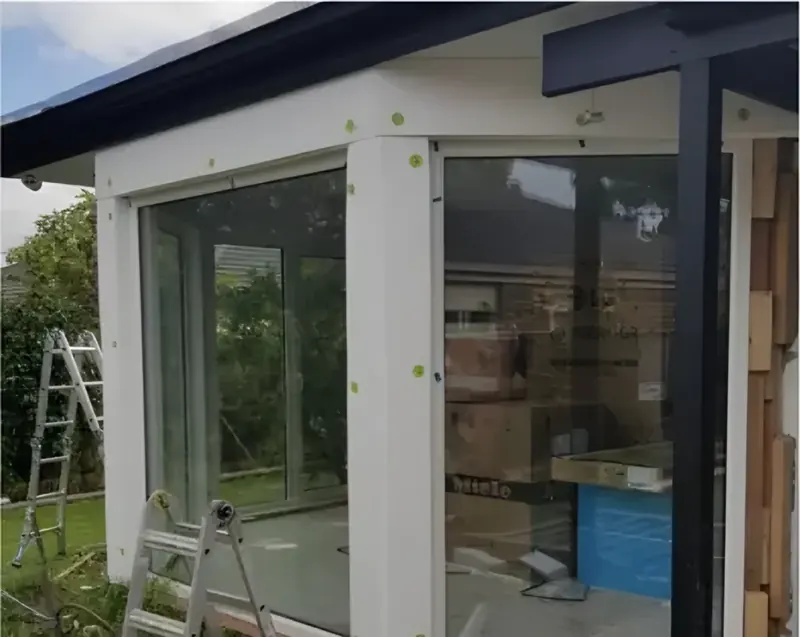 During: boards fixed to the bay window frame