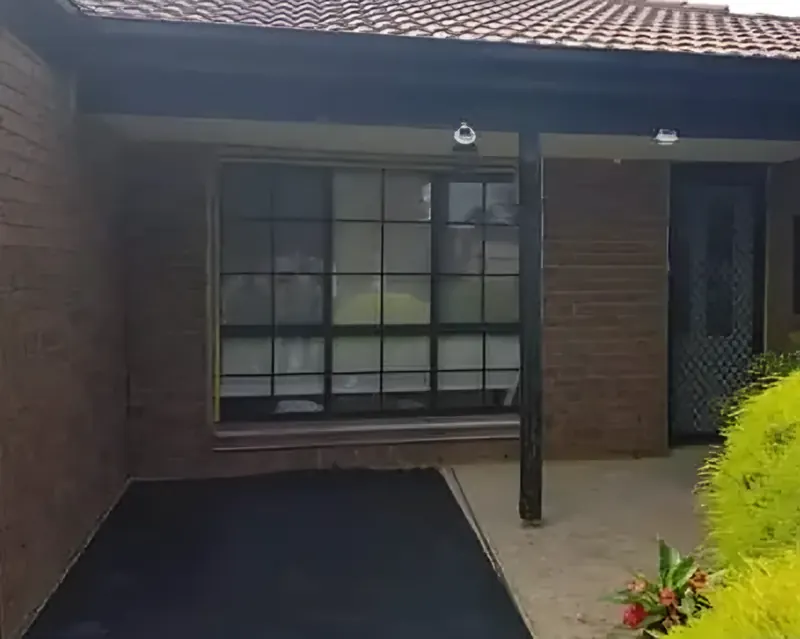 Before: brick front porch