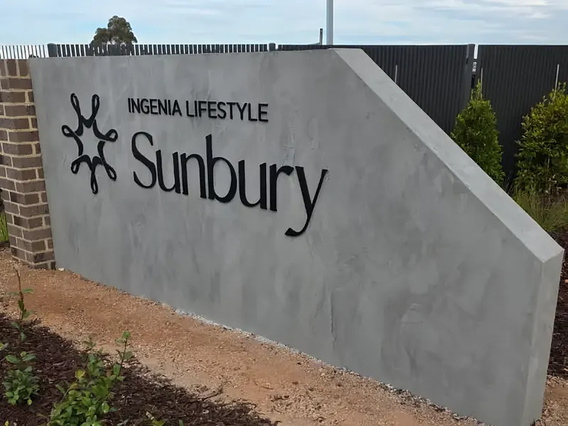 After: estate entry sign in Sunbury with a Venetian concrete finish look
